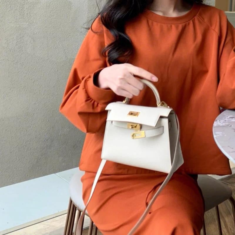 Structured Top Handle Leather Handbag with Gold Lock